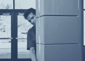 Man Carrying Boxes - Premises Liability Lawyer
